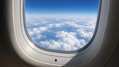 the hidden reason plane windows have tiny holes what travellers should know before their next flight