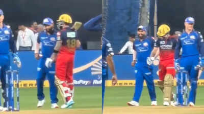 virat kohli cracks rohit sharma up during rcb vs mi clash screengrabs